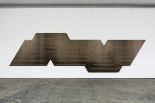 
     <i>Stella Bild (de la nada vida a la nada muerte)</i>, 
     2010<br />
     Mini dv tape on canvas, 
      215 x 744 cm<br />
     