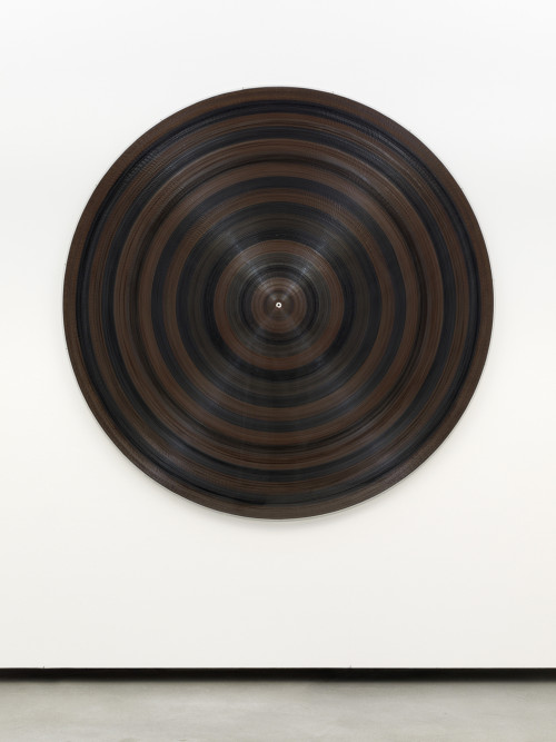 
     <i>Target Platte</i>, 
     2014<br />
     plexi, cassette reel, cassette tape, wood, 
      ø 172 cm<br />
     