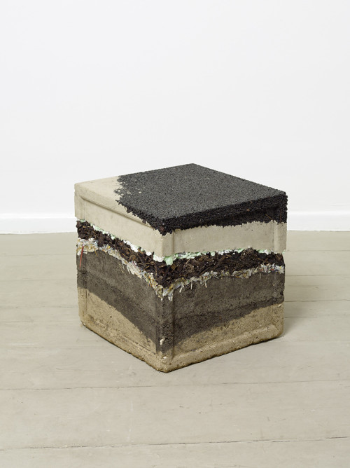 
     <i>learning cube (soil sample)</i>, 
     2011<br />
     pebbles, sand, Styrofoam, wood chips, Paper, plastic and glass trash, dirt, epoxy, 
      42 × 42 × 42 cm<br />
     