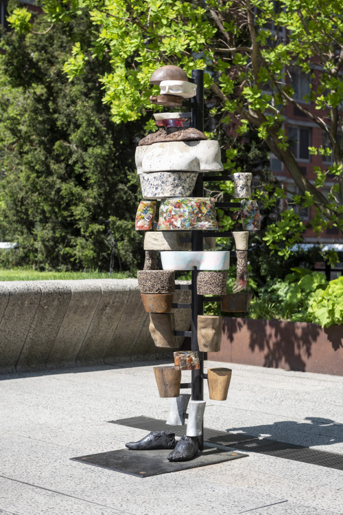 
     <i>The Dig of No Body (soil sample)</i>, 
     2011/2018<br />
     copper, plaster, bronze, ground glass, resin, soil, cement, shells, plastic trash, clay, marble, horn, steel, sand, semi-precious stones, wood, aluminium, Coal, Steel base, 
      186 x 72 x 68 cm<br />
     Installation view Agora, a High Line Commission, New York 2018/2019