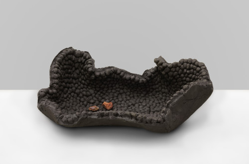 <i>intimacy with mortals 11</i>, 2022<br />Ceramics, black grog, 30 x 85 x 52 cm<br />