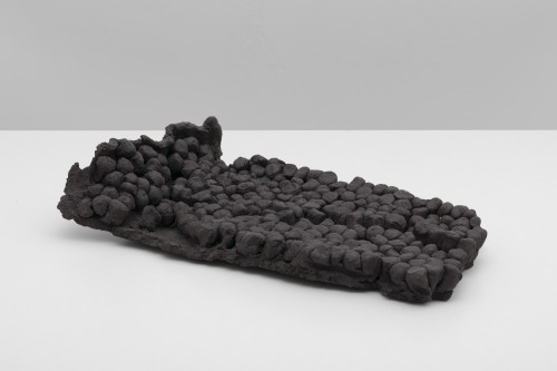 <i>intimacy with mortals 6</i>, 2022<br />Ceramics, black grog, 7 x 35 x 23 cm<br />